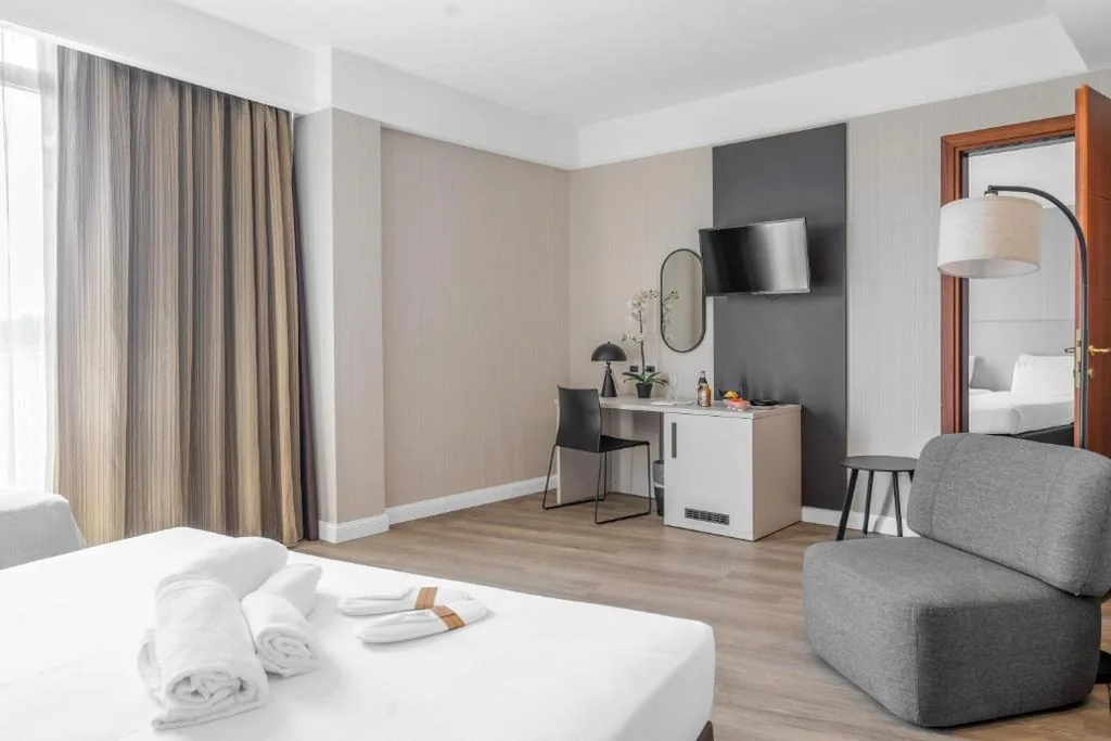 2 Camere Comunicanti — Hotel Capannelle Roma