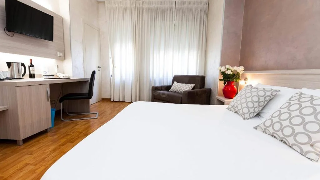 2 Camere Comunicanti — Hotel Lis