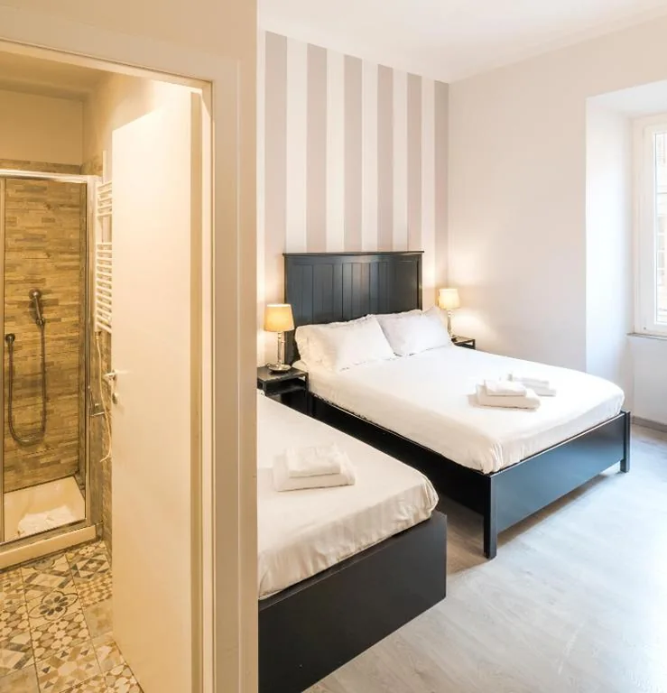 2 Camere Matrimoniali Comunicanti — Piazza Cavour Suite