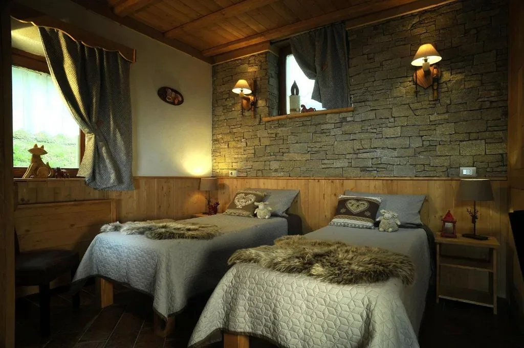 Aparthotel Foyer d’antan SUITE con caminetto hammam o vasca idromassaggio