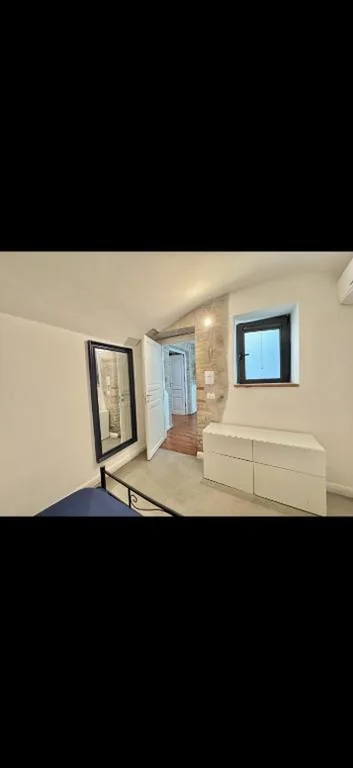 One-Bedroom Apartment — Domitilla