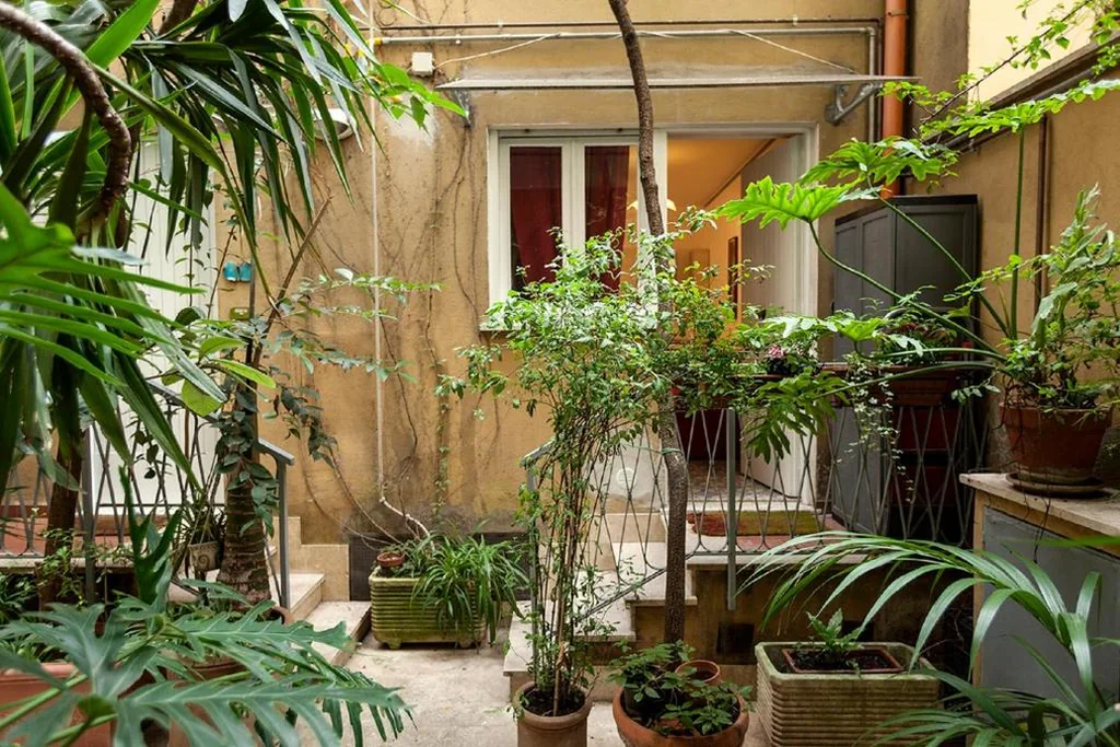 One-Bedroom Apartment with Garden View - Split Level — The Place In Rome Guest House