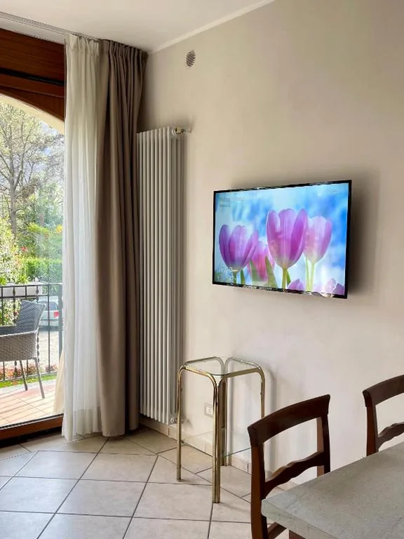 Apartment with Garden View — Residence Villa Margherita WITH POOL & HYDROMASSAGE