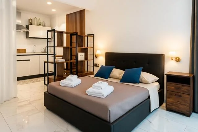 Studio Apartment with Balcony — Laura’s Rooms a due passi dal Vaticano By RIONI DI ROMA