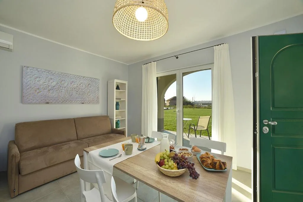Appartamento - Piano Terra — Barbaciiu Vacanze Green