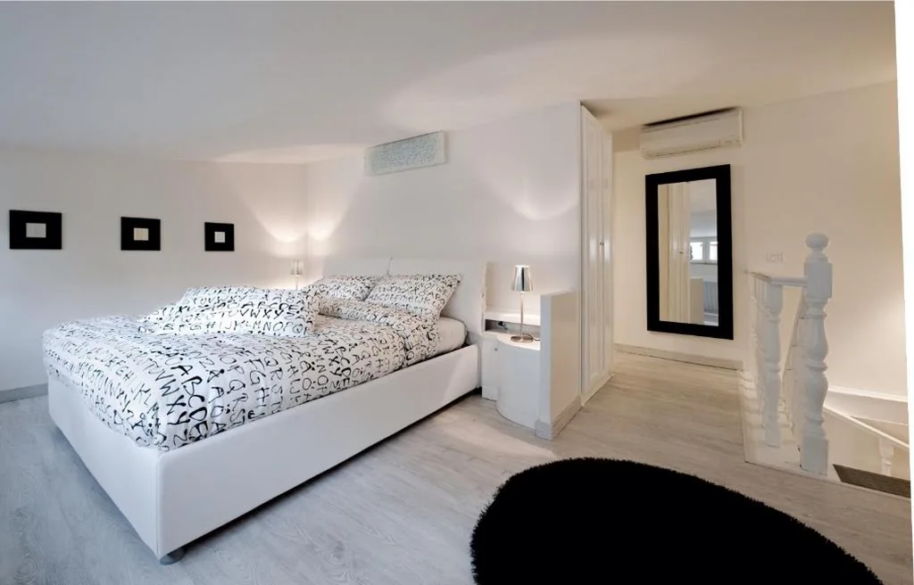 Two-Level Apartment with 1 Bedroom — Black And White Suite