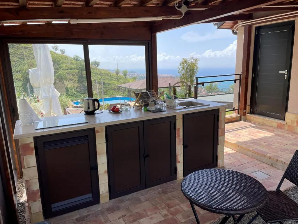 Deluxe Double Room with Balcony and Sea View — Casa Natura 40