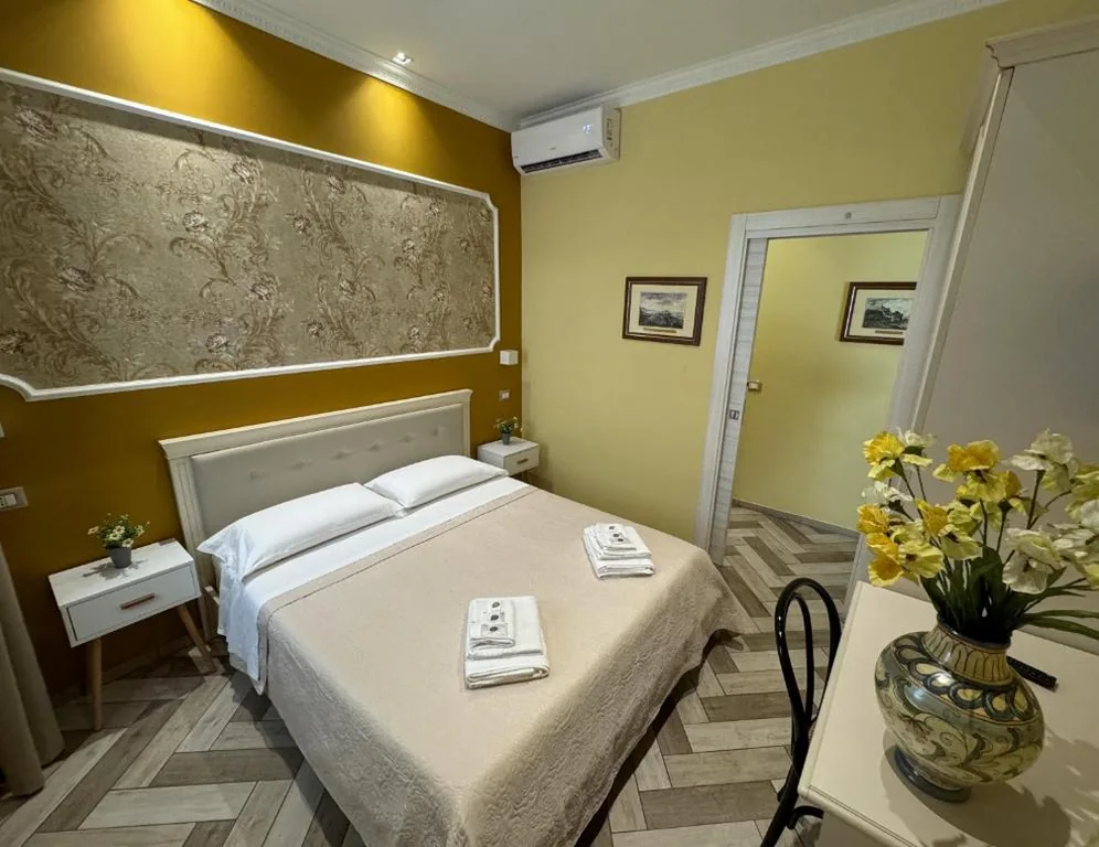Camera Quadrupla con Balcone — B&B Fiorentino