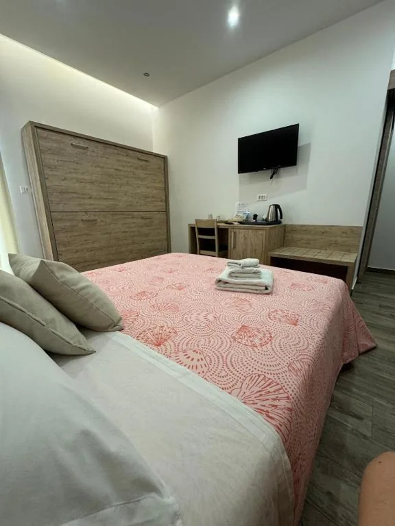 Quadruple Room with Balcony — B&B Giglio di mare