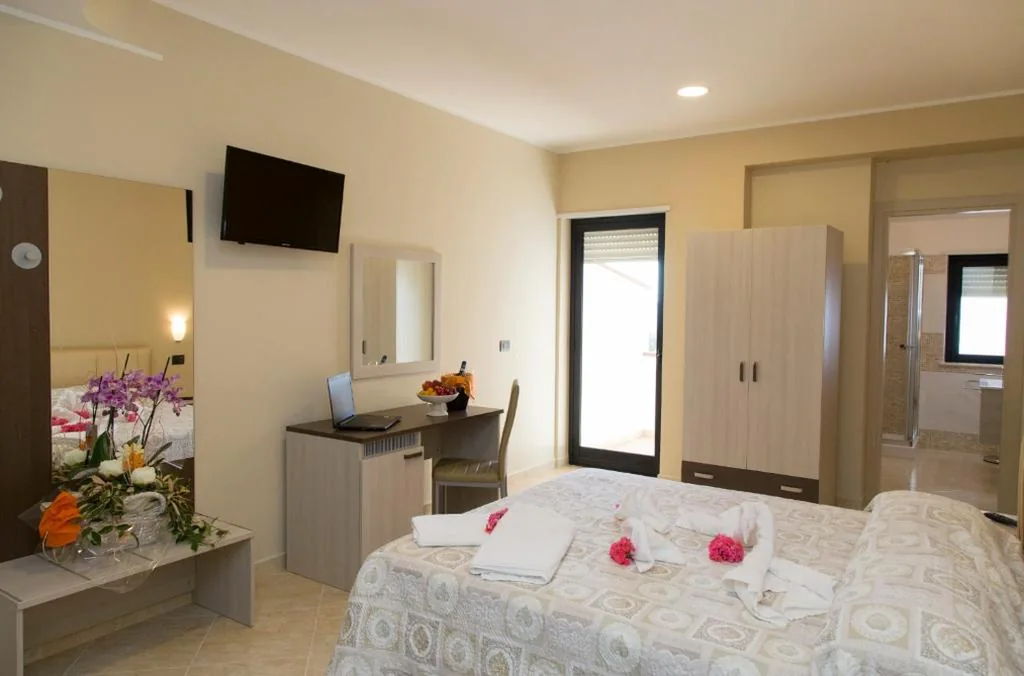 Quadruple Room — Hotel campagnola