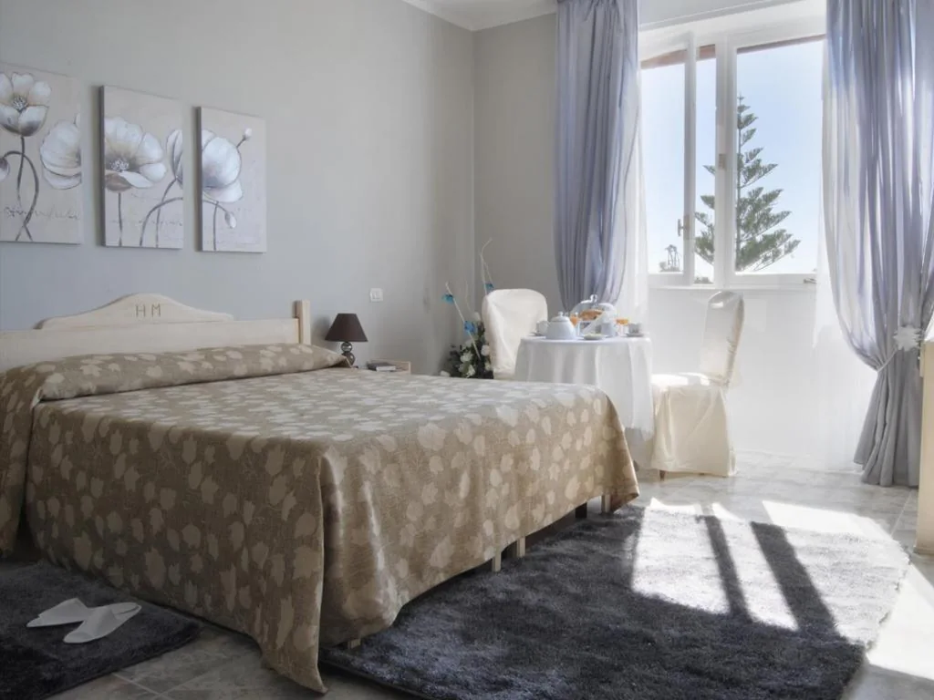 Quadruple Room — Hotel Mediterraneo