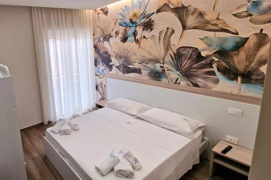 Camera Quadrupla Luxury — ARIA DI MARE LUXURY B&B