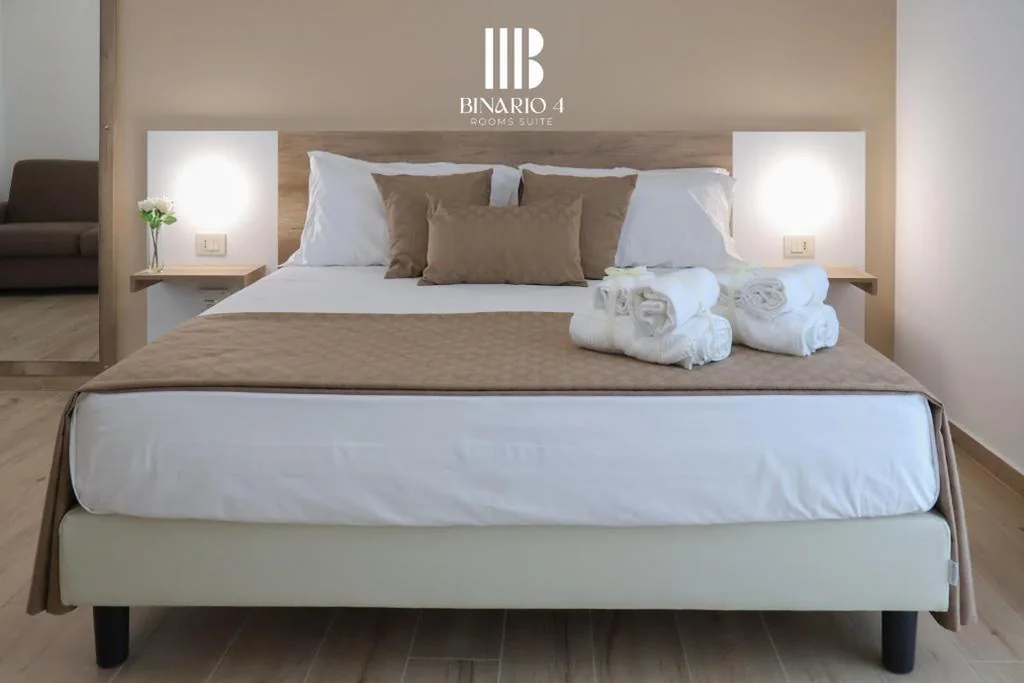 Camera Quadrupla Superior — Binario 4 Rooms Suite