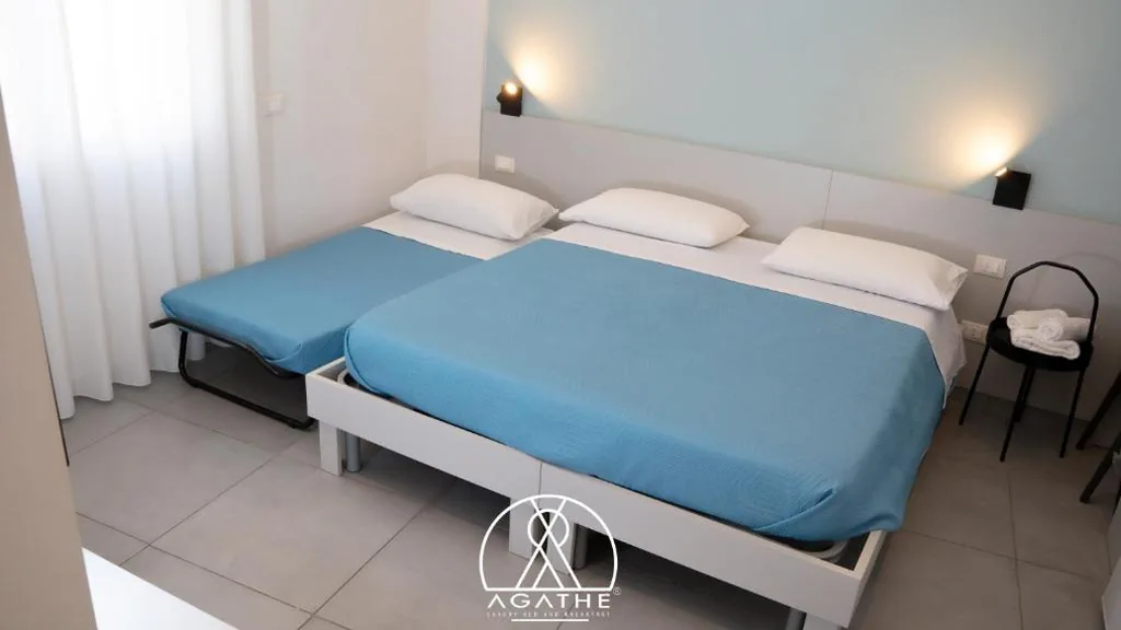 Camera Tripla con Bagno Privato — Agathè Luxury Bed and Breakfast