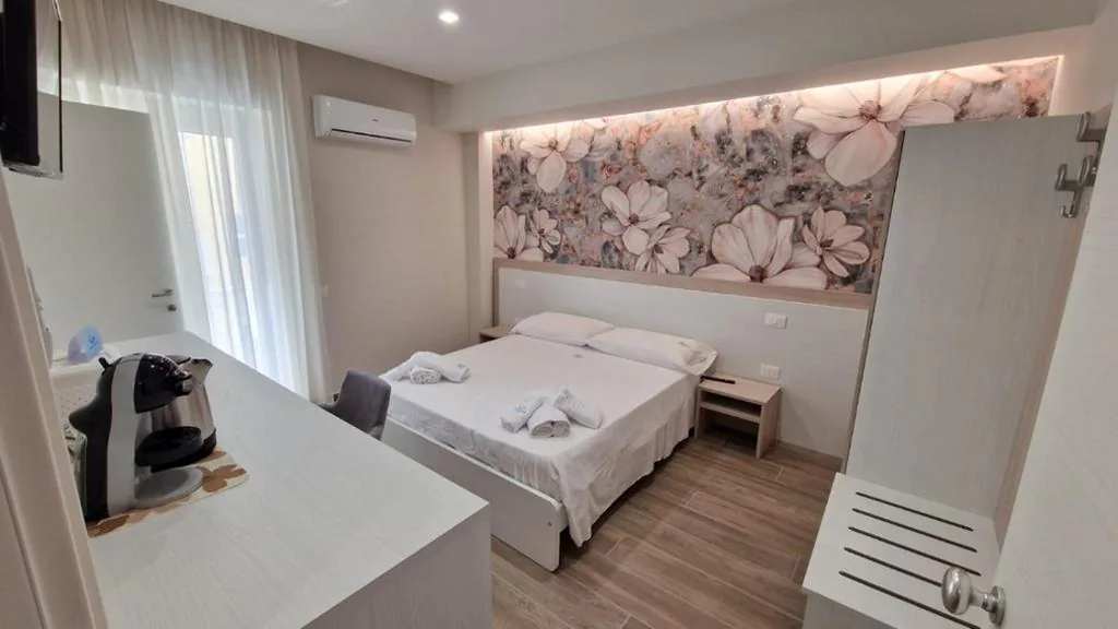 Camera Tripla Luxury — ARIA DI MARE LUXURY B&B