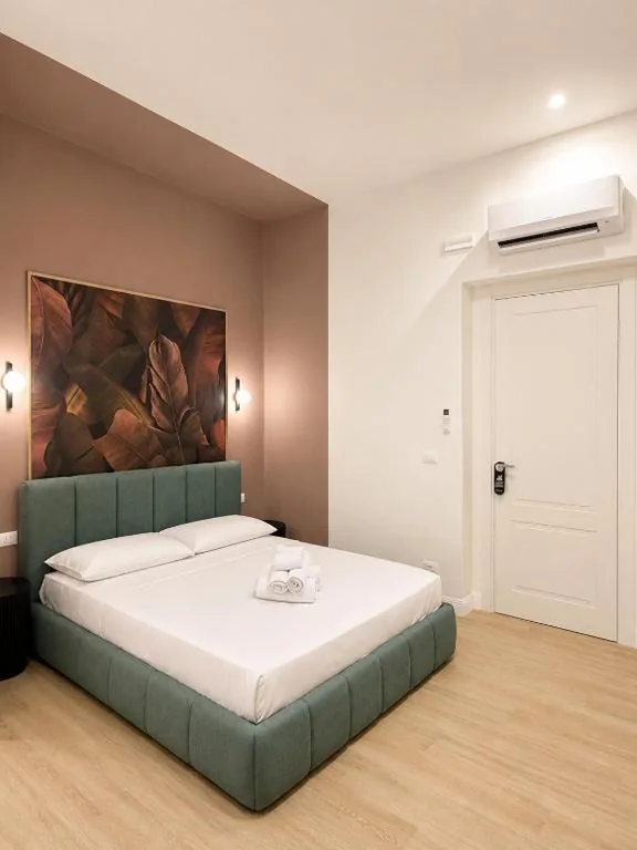 Superior Triple Room — Xenia Suites Duomo