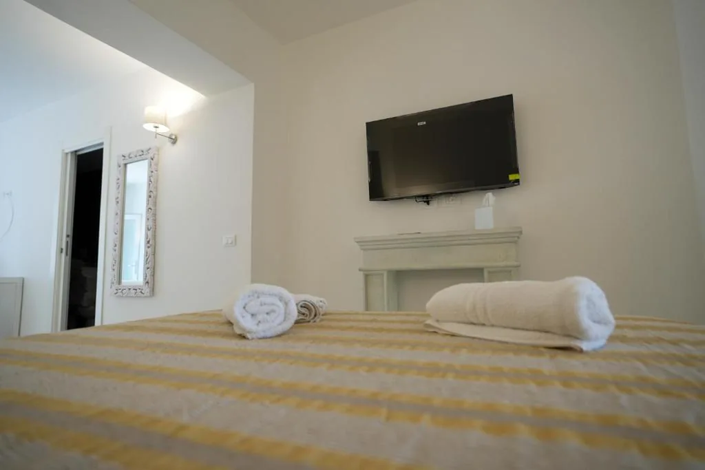 Junior Suite con Terrazza — Praialonga Suites with Pool and Garden