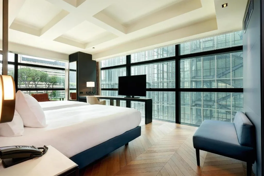 Corner Room with 2 Double Beds — Hilton Rome Eur La Lama