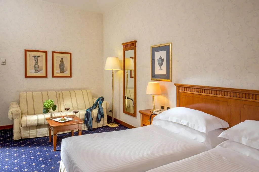 Classic Twin Room with Extra Bed — UNA Hotels Empire Roma