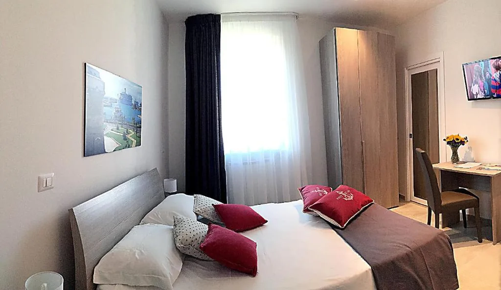 Room with Balcony — Quattro Stelle al Porto Guest House