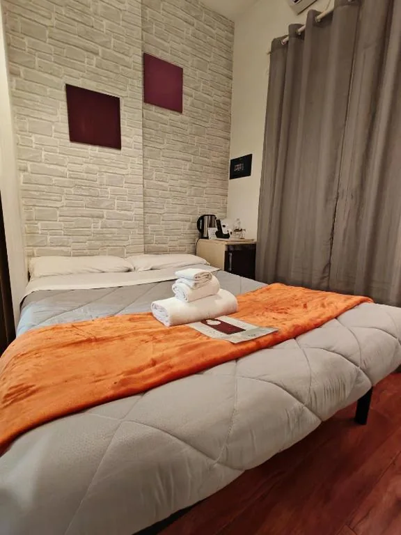 Camera Deluxe (1 Adulto + 1 Bambino) — AD 111 ColaDiRienzo Rooms – by AD Roma