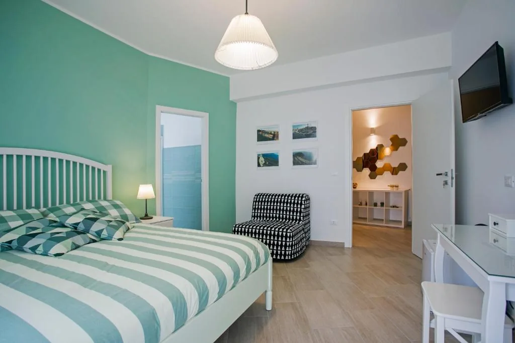 Camera Deluxe (2 Adulti + 1 Bambino) — B&B Sapore di Mare al Corso
