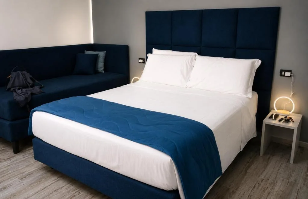 Deluxe Room (2 Adults + 1 Child) — Cola di Rienzo Inn