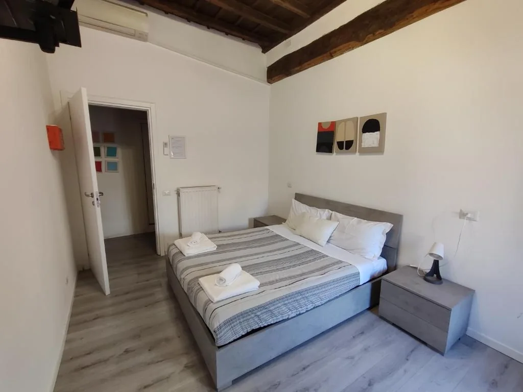 Deluxe Room (2 Adults + 1 Child) — Giubbonari Street