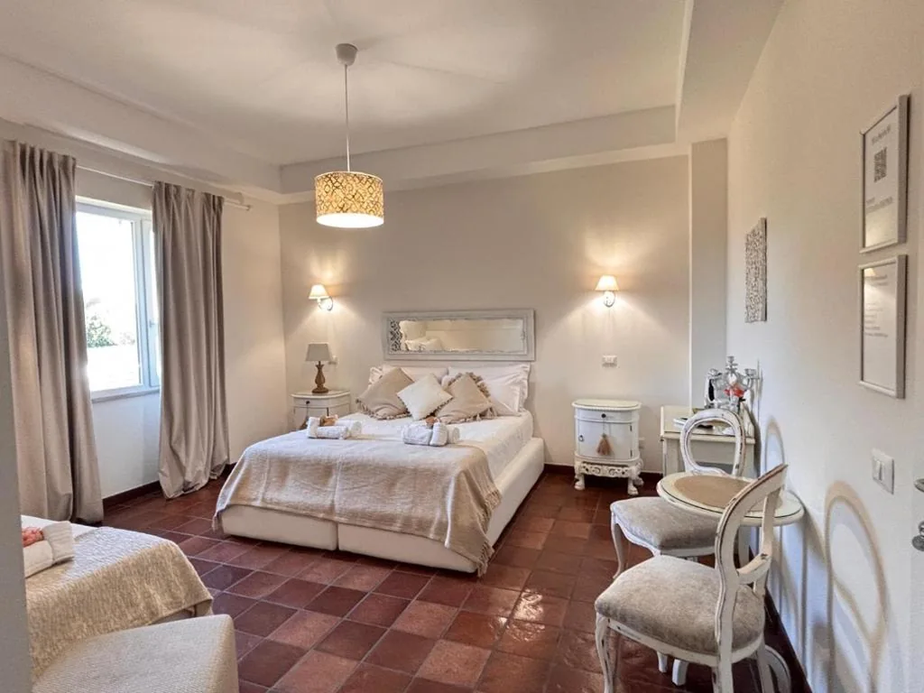 Camera Deluxe (2 Adulti + 1 Bambino) — La Magnolia 140