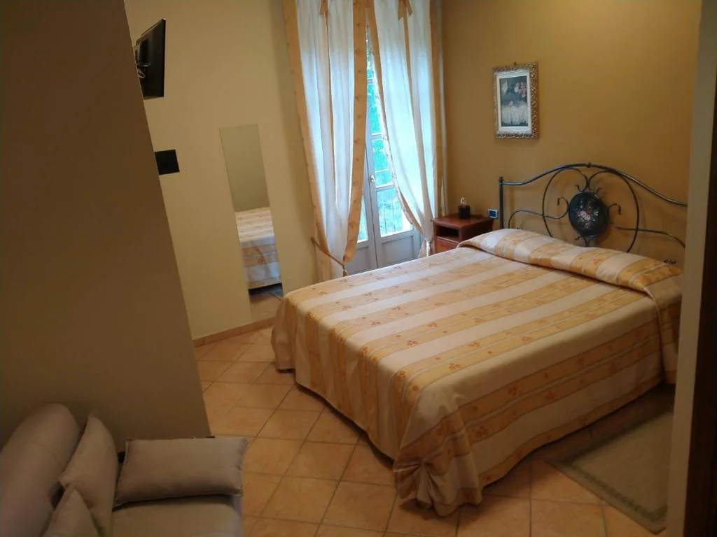 Camera Deluxe (2 Adulti + 1 Bambino) — La Regibussa – Hotel Ristorante
