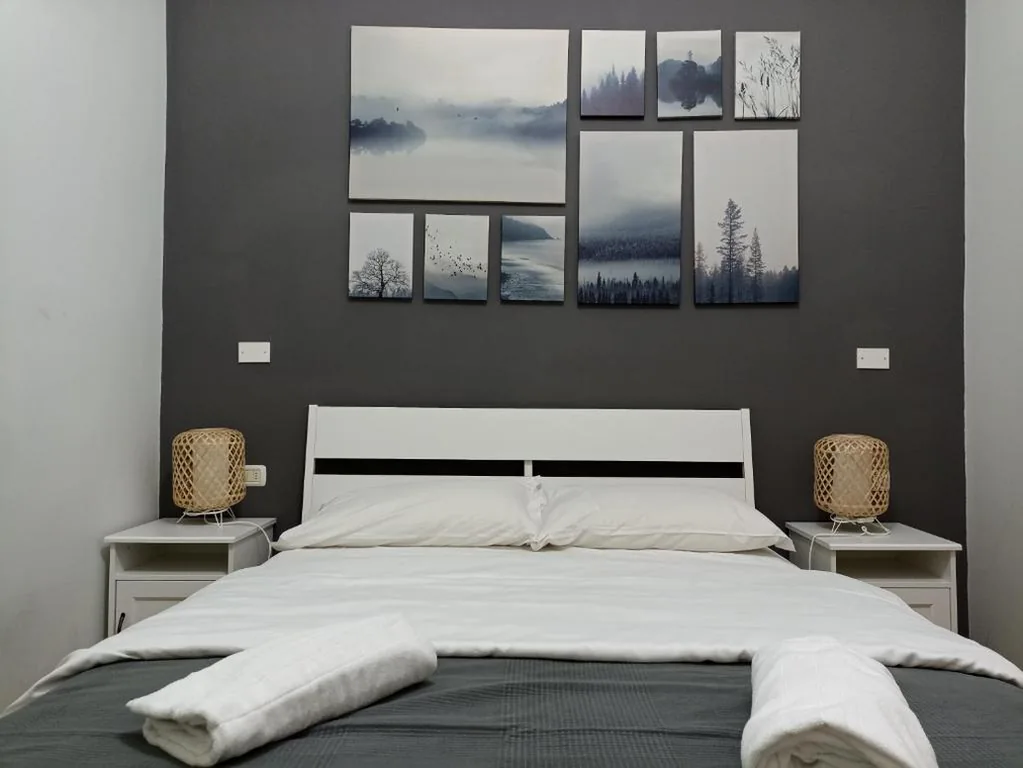 Deluxe Room (2 Adults + 1 Child) — Martini Rooms