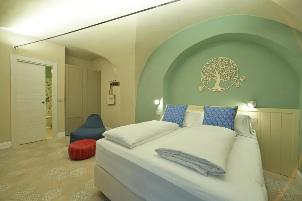 Deluxe Room (2 Adults + 1 Child) — Muri Vecchi
