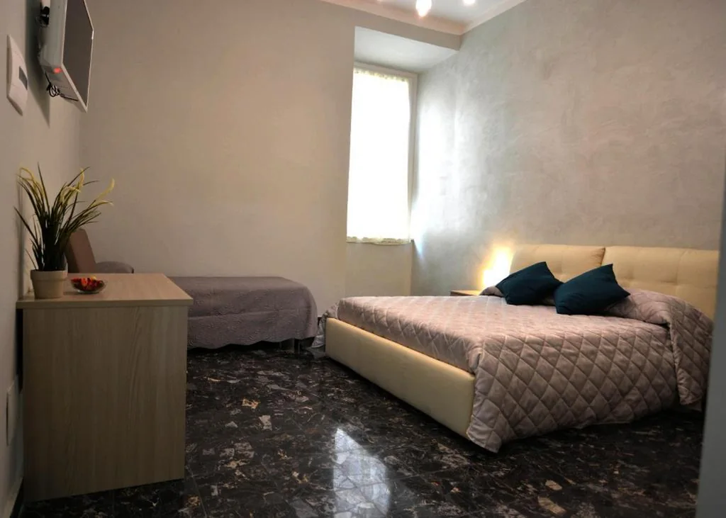 Camera Deluxe (2 Adulti + 1 Bambino) — Residence Stendhal Guest House