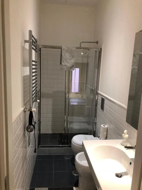 Deluxe Room (2 Adults + 1 Child) — Spazio Cavour Guesthouse