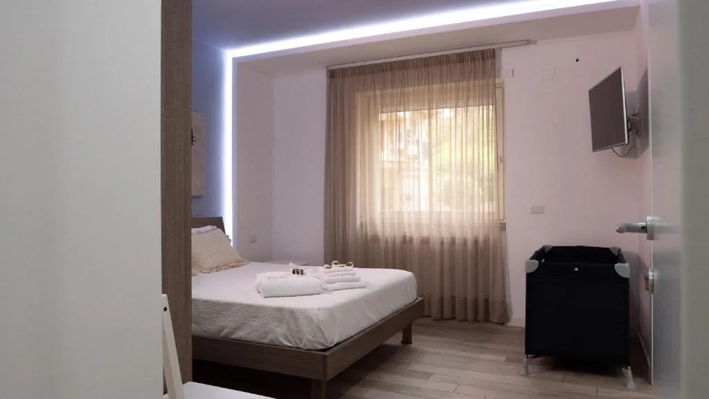 Camera Deluxe (2 Adulti + 1 Bambino) — Wanderlust Guesthouse