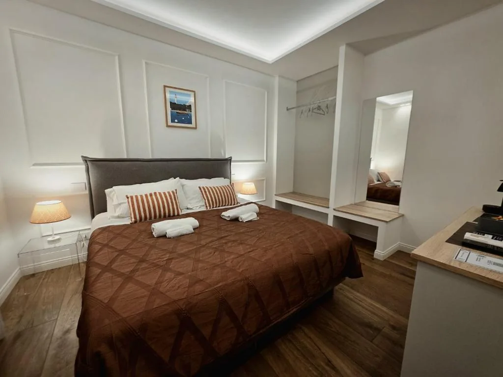 Deluxe Room — Be Your Home – Riviera Suites