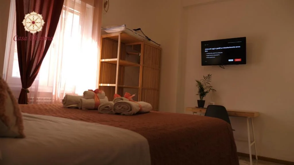 Camera Deluxe — Casa Dharma Guest House