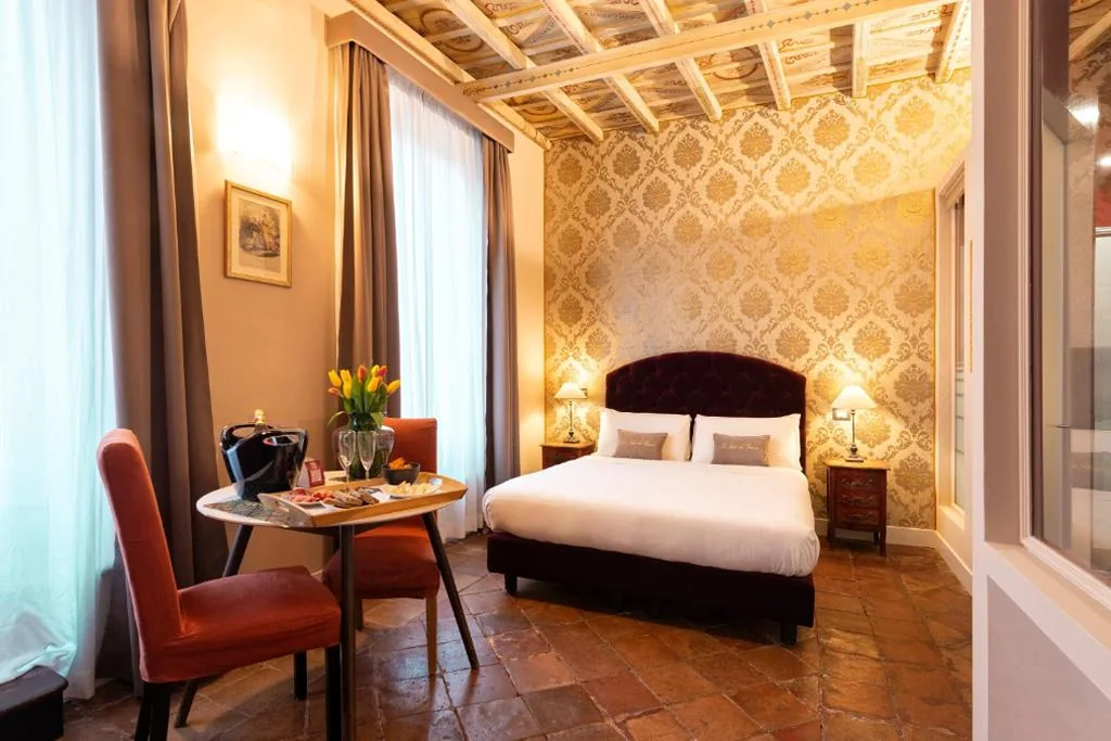 Deluxe Room with Balcony — Le Suite del Barone