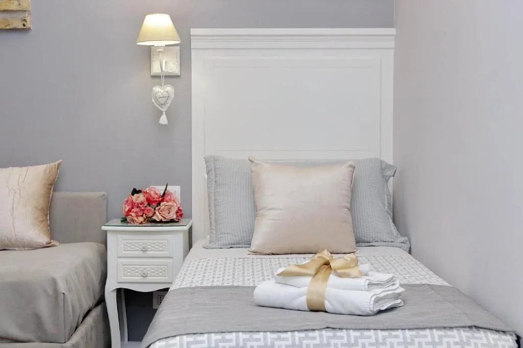 Deluxe Twin Room — Roman Holiday Suites
