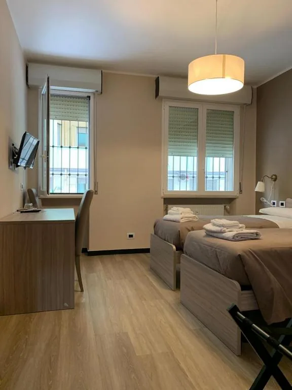 Camera Deluxe Doppia con Letti Singoli — St Martin House