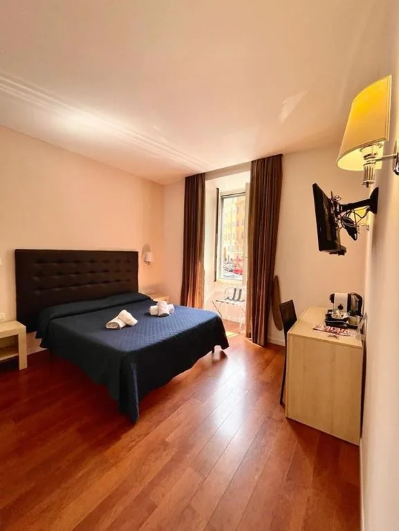 Deluxe Room — Elle Cavour Guest House
