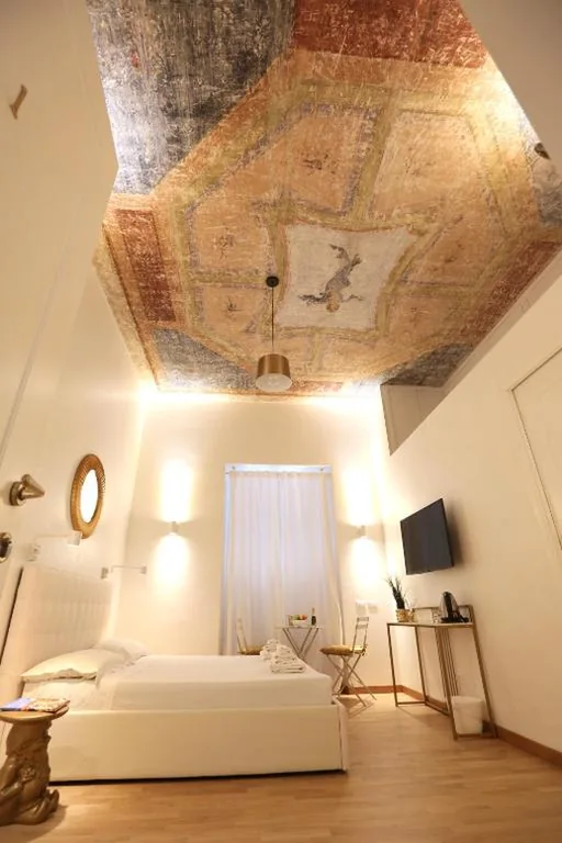 Camera Deluxe — KISS ME ROME Luxury Rooms