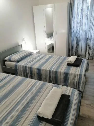 Camera Deluxe Matrimoniale/Doppia con Letti Singoli — Albergo blue fish