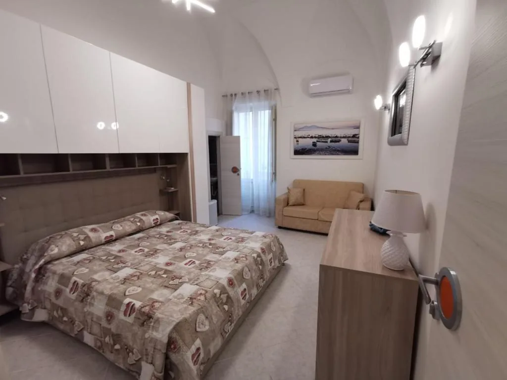 Camera Deluxe Matrimoniale/Doppia con Letti Singoli — Coral – La Pescheria Casa Vacanze