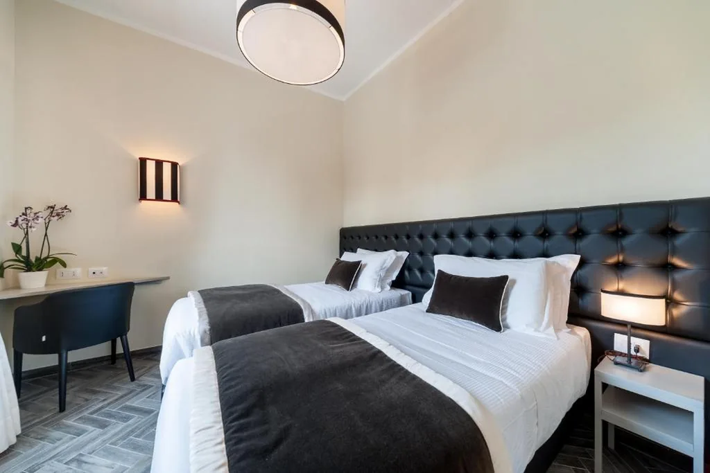 Camera Deluxe Matrimoniale/Doppia con Letti Singoli con Vista Città — Foro Romano Luxury Suites