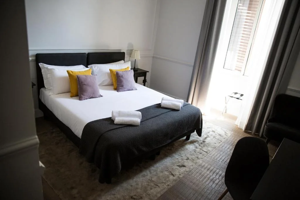 Camera Deluxe Matrimoniale/Doppia con Letti Singoli — Holidays Suites Navona