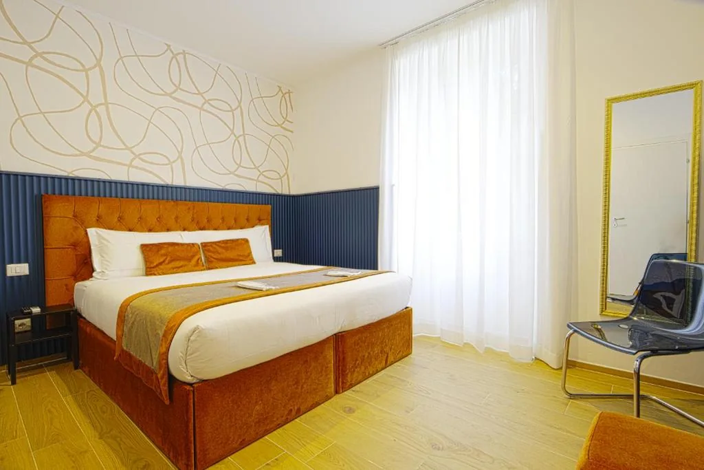 Camera Deluxe Matrimoniale/Doppia con Letti Singoli — Home at Rome Vatican Suites