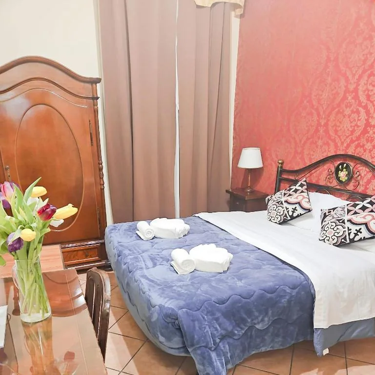 Camera Deluxe Matrimoniale/Doppia con Letti Singoli — Hotel Giubileo