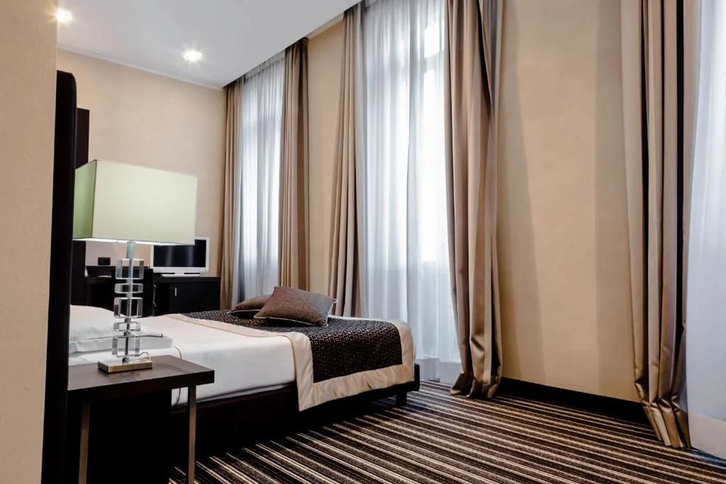 Camera Deluxe Matrimoniale/Doppia con Letti Singoli — Hotel Principe Di Torino