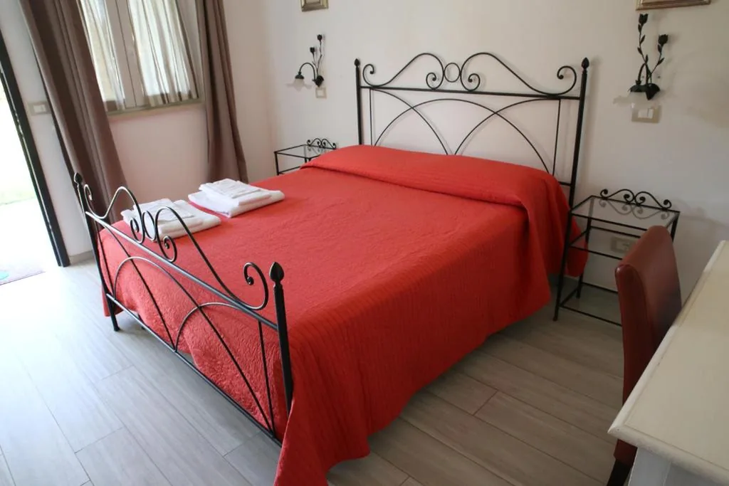 Camera Deluxe Matrimoniale/Doppia con Letti Singoli con Vista Giardino — Mabell Guest House